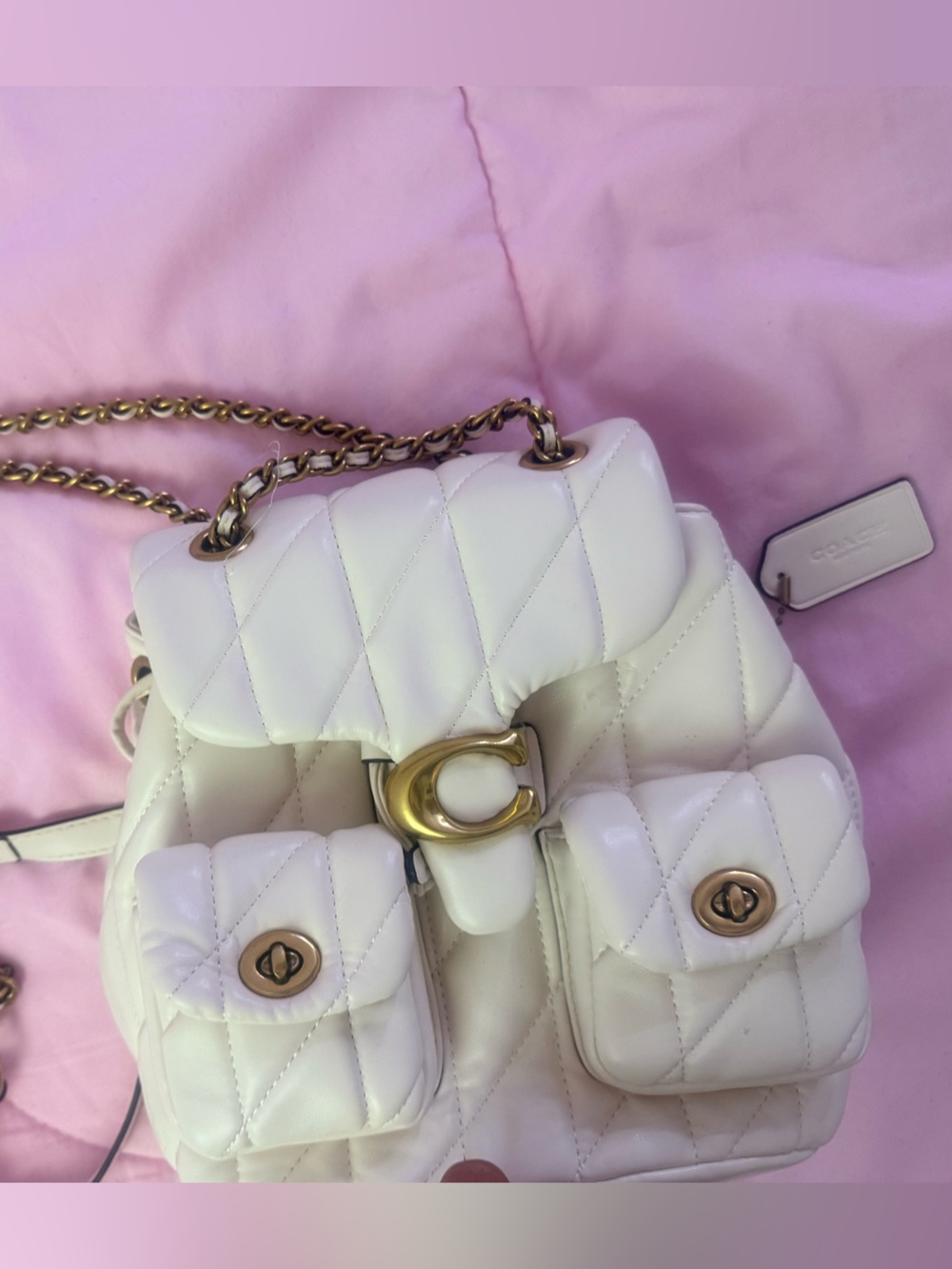 White quilted backpack